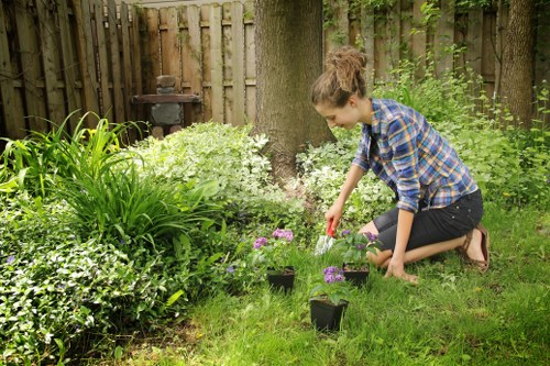 Landscaping team preparing a garden service booking